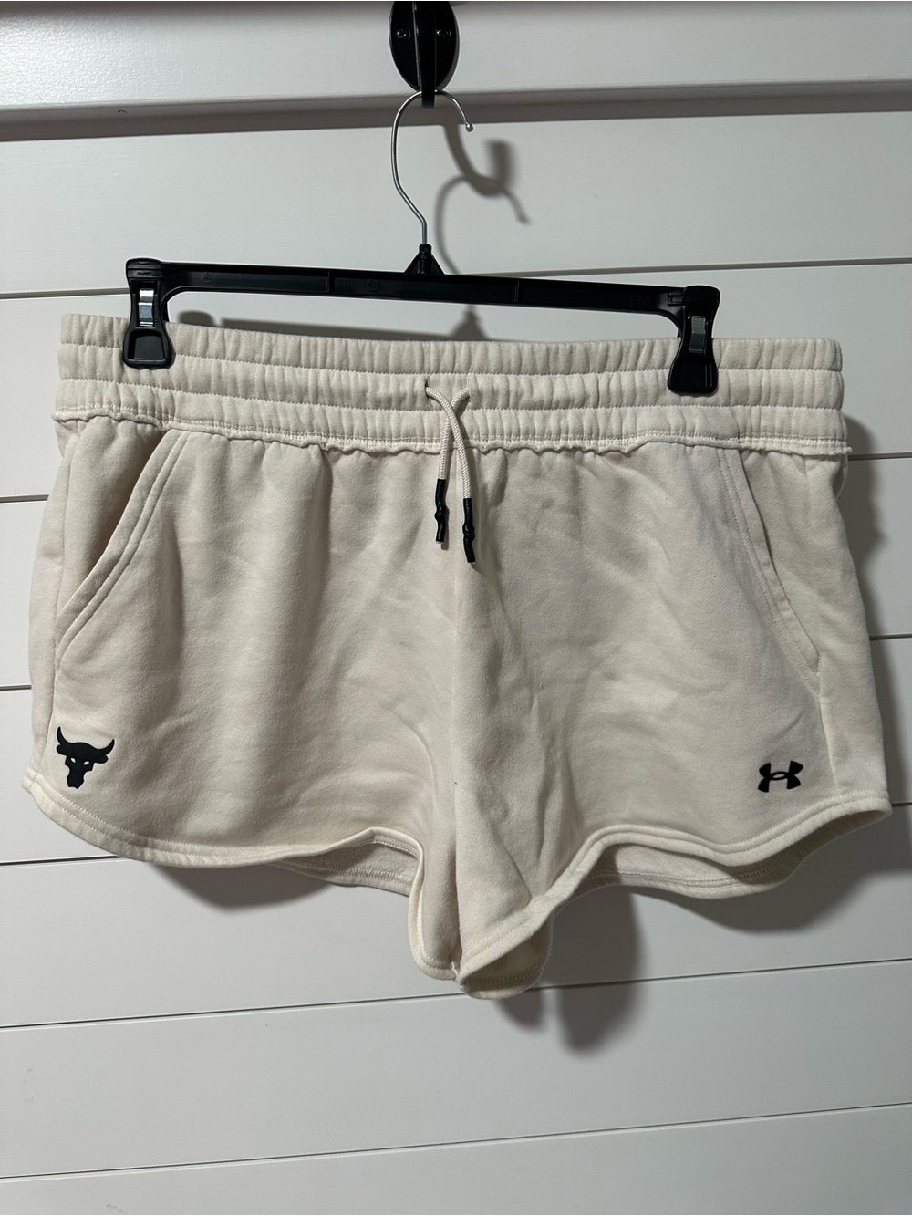 Under Armour Women's Cream Athletic Shorts with Black Logos